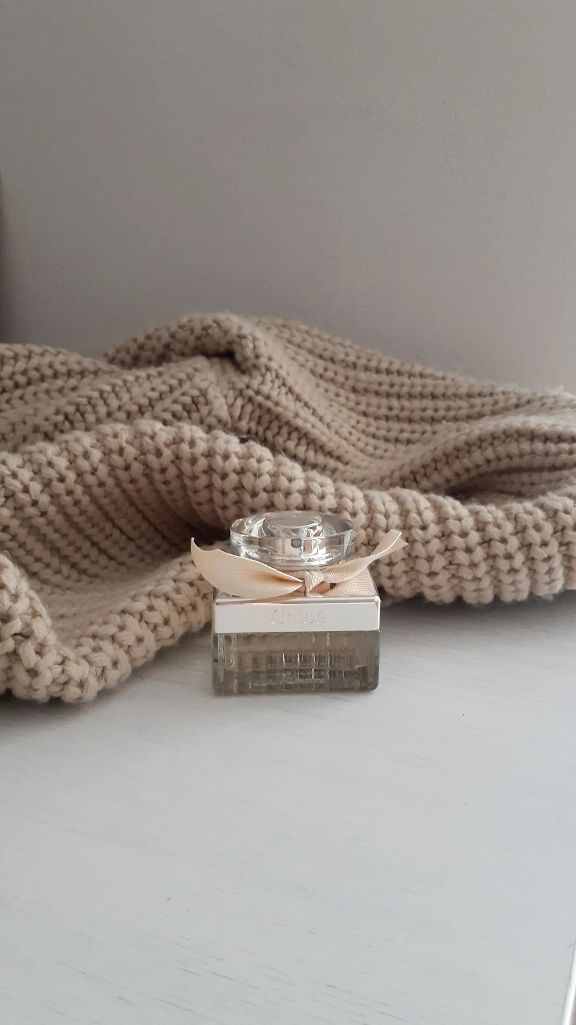 Cachemire Doux bottle on blanket