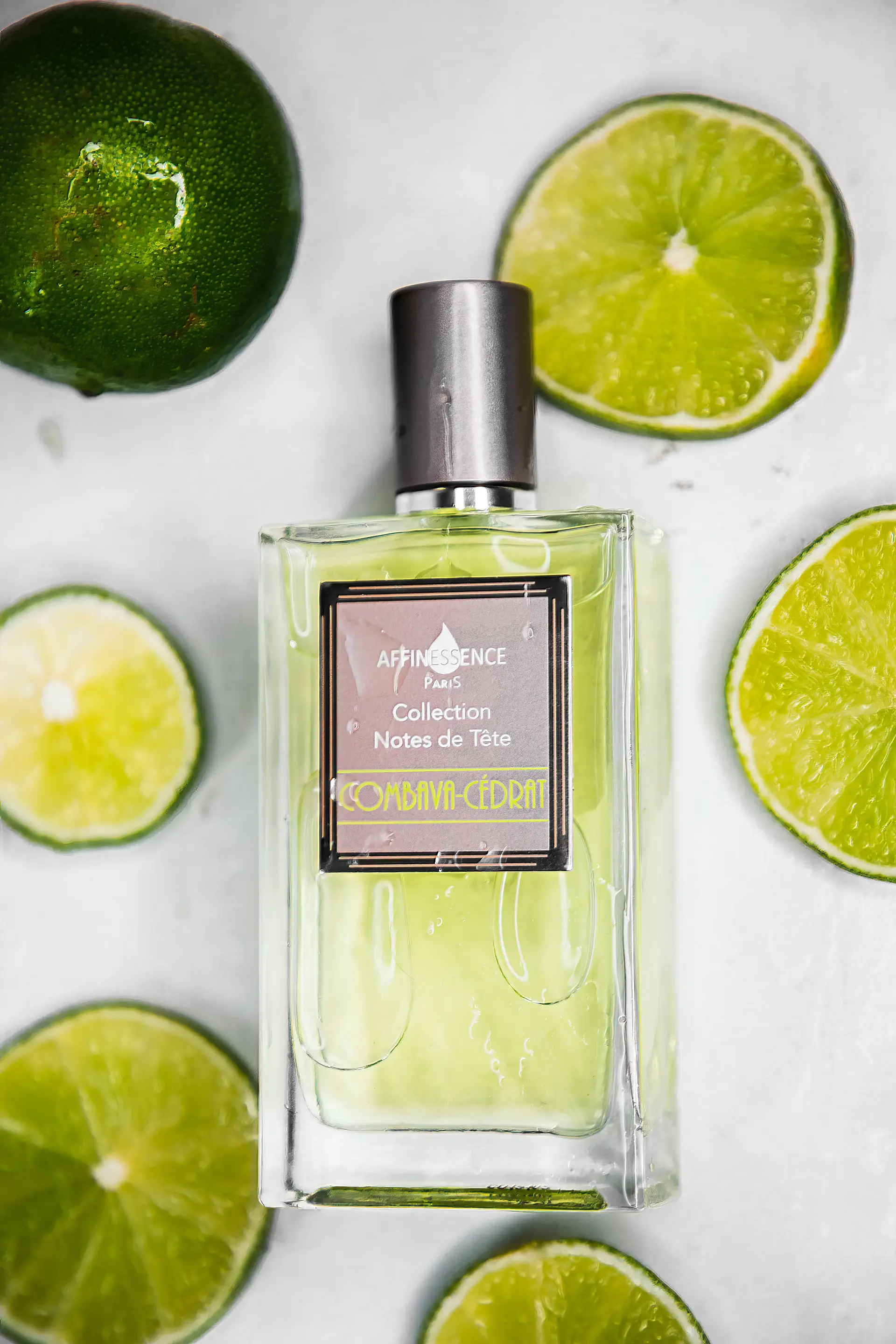 Fresh green limes and aromatic herbs